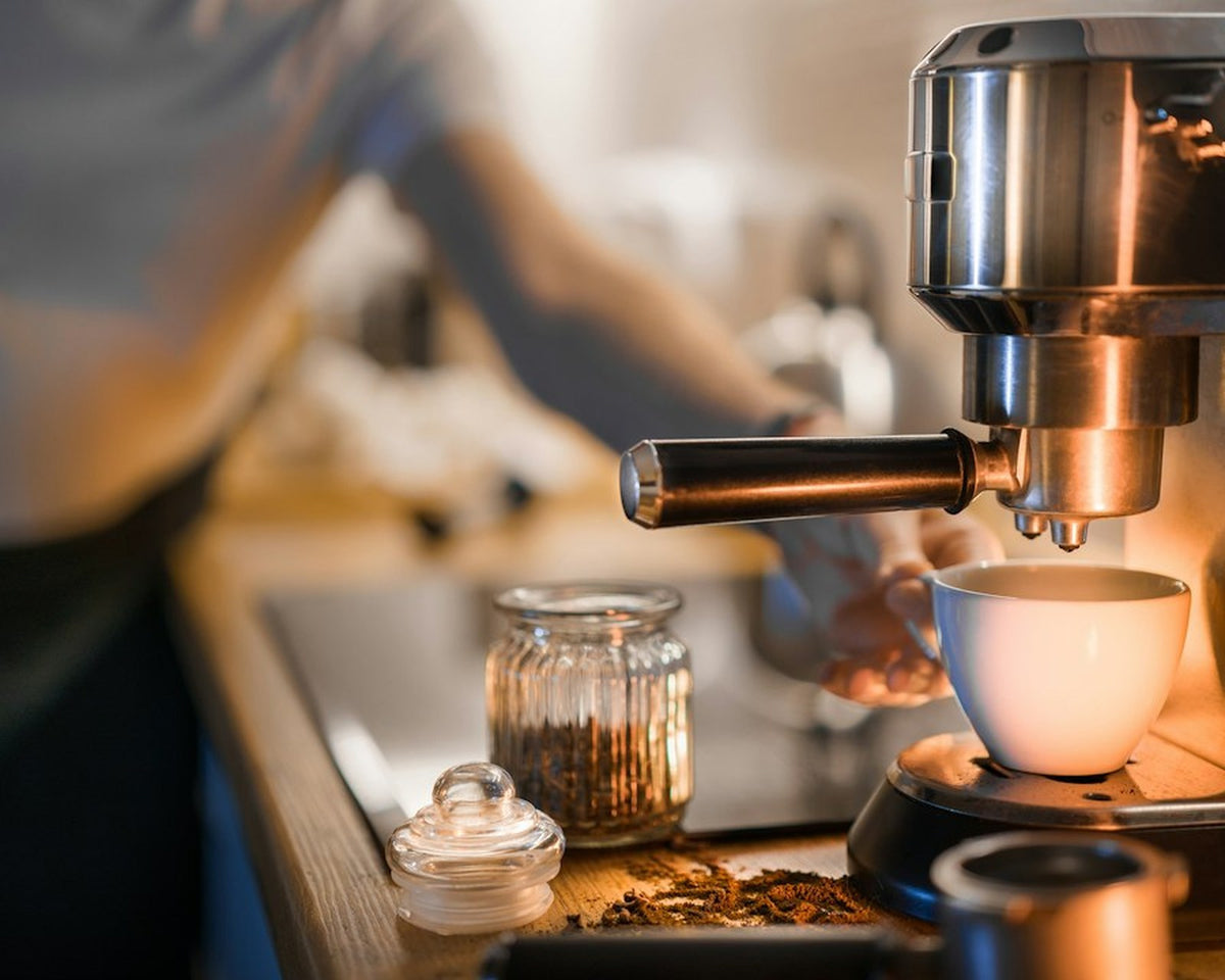 Espresso machine pouring coffee